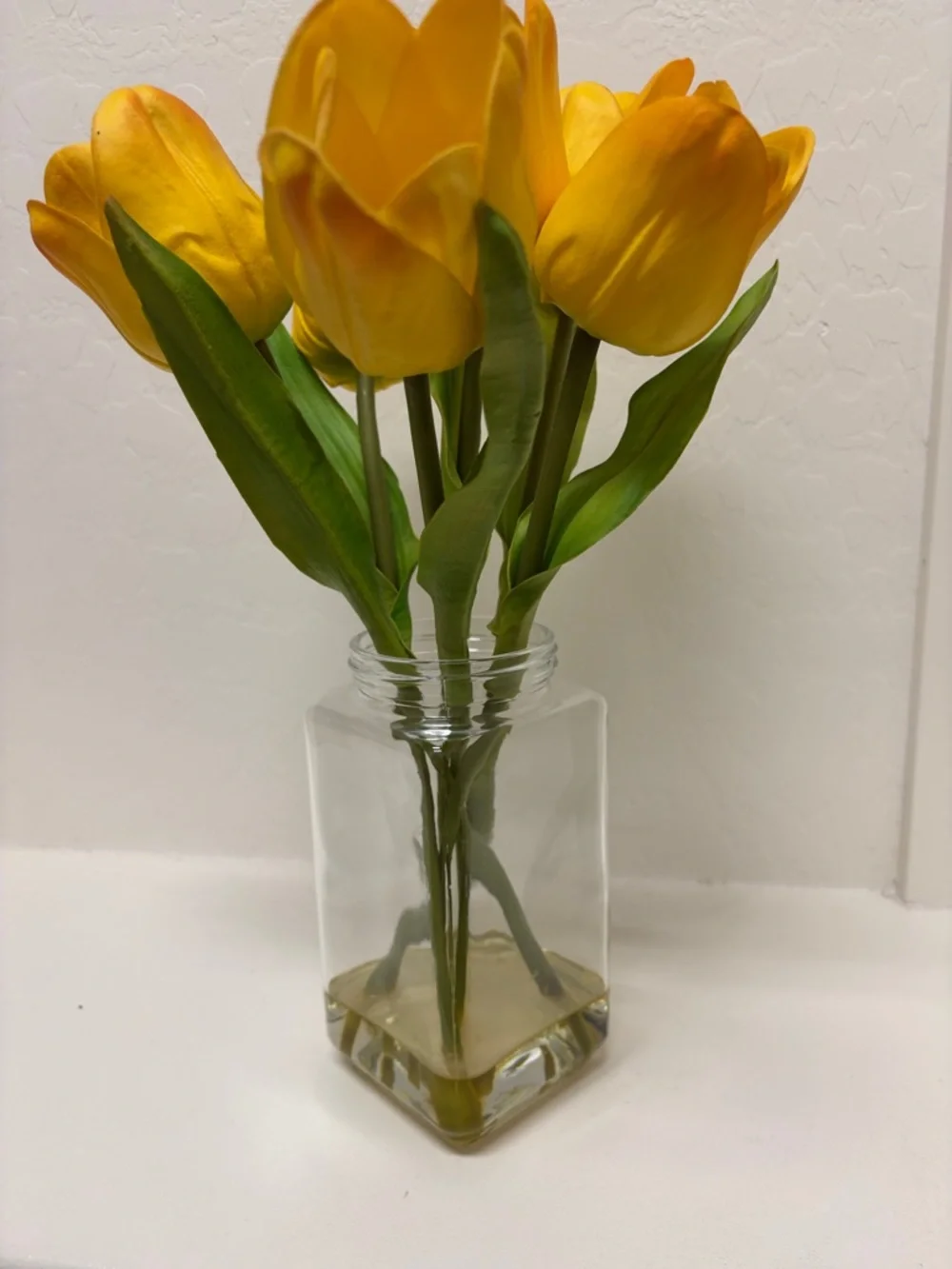 Bright Yellow Tulip Faux Floral Arrangement in Clear Glass Vase